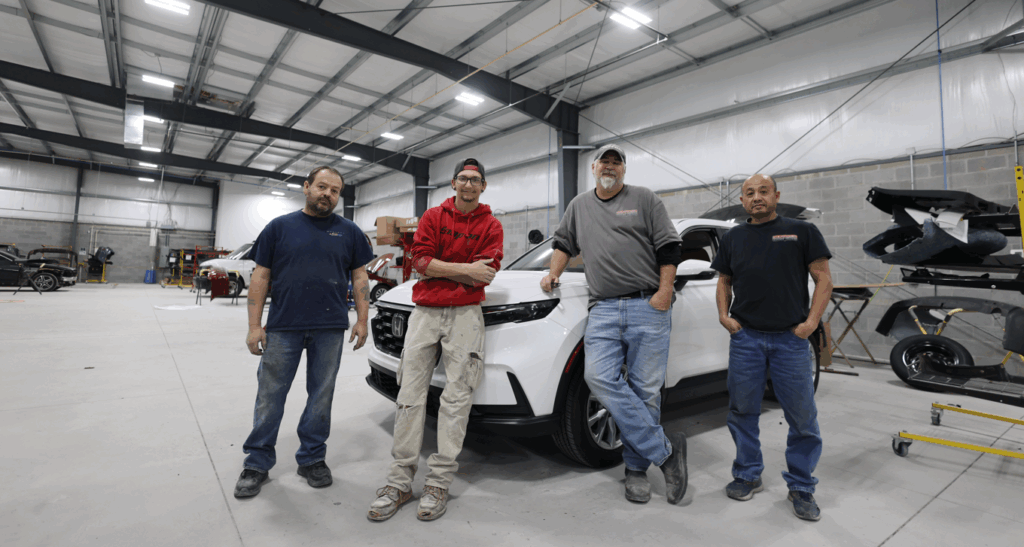 Technicians performing auto body and collision repair at Burnside Express Collision in Zionsville Indiana, serving drivers from Carmel, Whitestown, and northwest Indianapolis