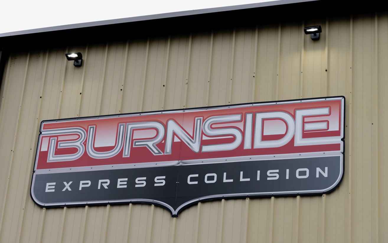 Burnside Express Collision sign on the exterior of the West Indianapolis auto body repair shop.