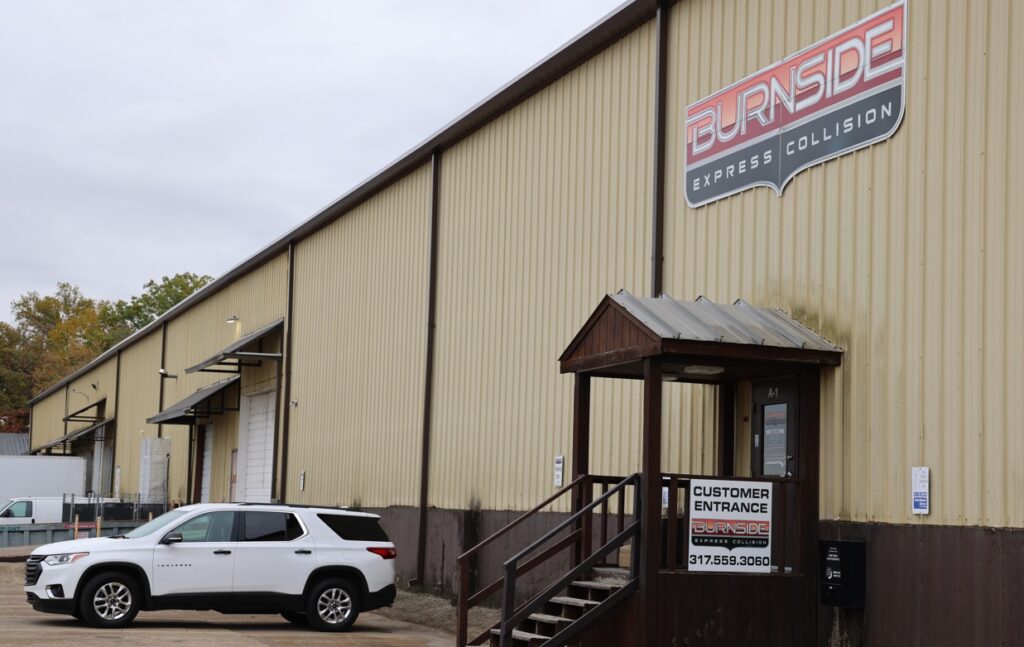 Exterior photo of Burnside Express Collision’s West Indianapolis auto body repair shop, showing the building and entrance.